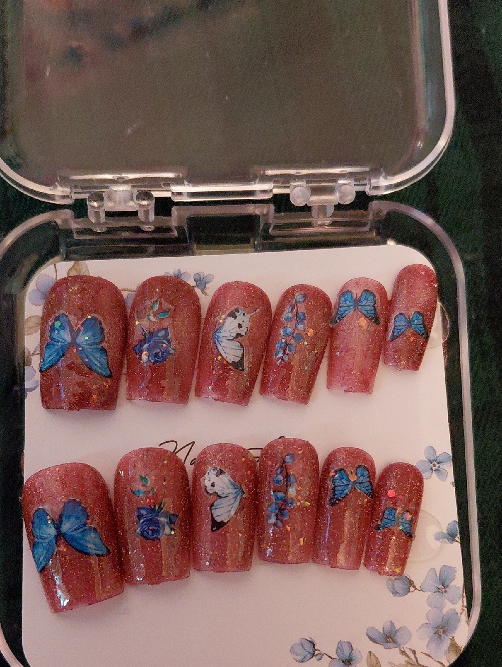 Sparkling Rust Orange Press-On Nails with Blue Butterfly & Floral Art